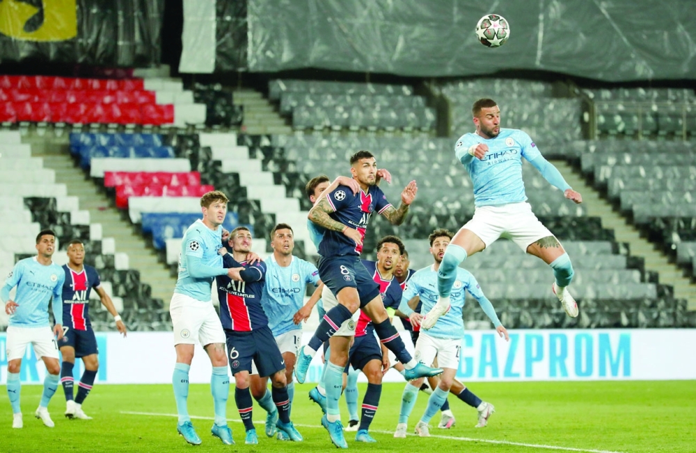 Soccer Football - Champions League - Semi Final First Leg - Paris St Germain v Manchester City - Parc des Princes, Paris, France - April 28, 2021 Manchester City's Kyle Walker in action as Paris St Germain's Leandro Paredes looks on REUTERS/Benoit Tessier
