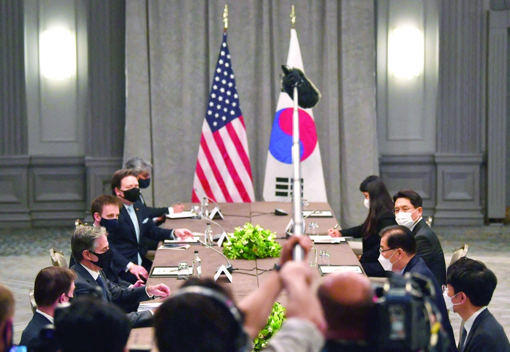 US Secretary of State Antony Blinken speaks with South Korea's Foreign Minister Chung Eui-yong during a bilateral meeting in London during the G7 foreign ministers meeting. - AFP 