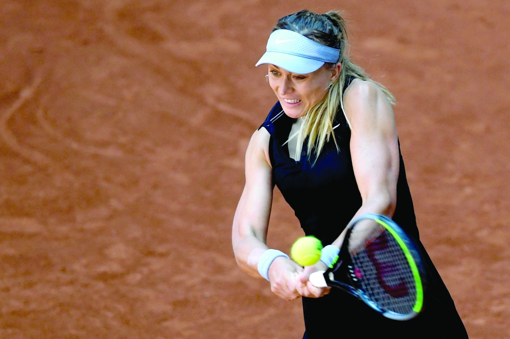 Spain's Paula Badosa returns a shot to Switzerland's Belinda Bencic. -- AFP