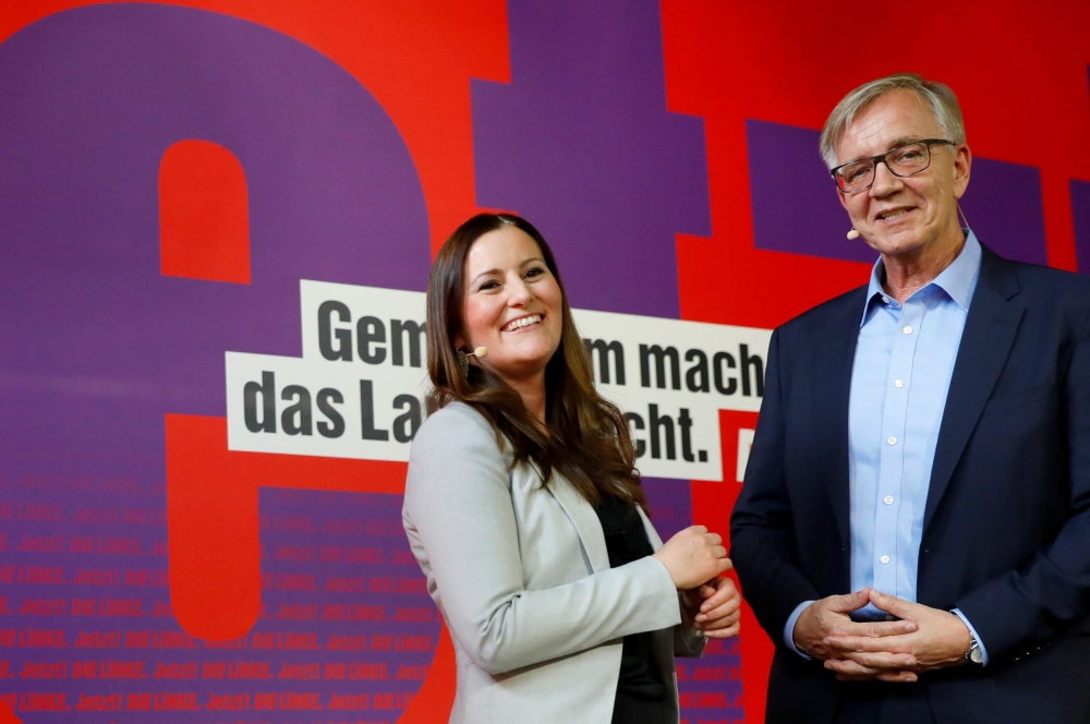 Germany's co-leader of Die Linke party Janine Wissler and a party member Dietmar Bartsch pose following a media event to announce party's candidates for the federal elections in Berlin. - Reuters
