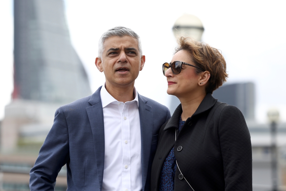 Mayor of London Sadiq Khan and wife Saadiya Ahmed arrive for his signing in ceremony after being re-elected as a mayor, at the Shakespeare's Globe in London. - Reuters