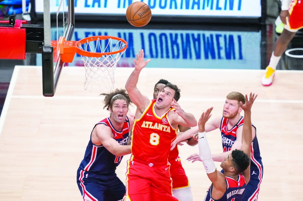 Atlanta Hawks' Danilo Gallinari (8) watches his shot against the Washington Wizards. -- USA Today Sports