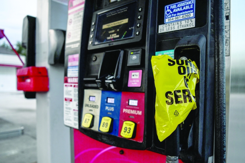 Out of order notes are left on gas pumps to let motorists know the pumps are empty at a gas station in Hollywood. - AFP 
