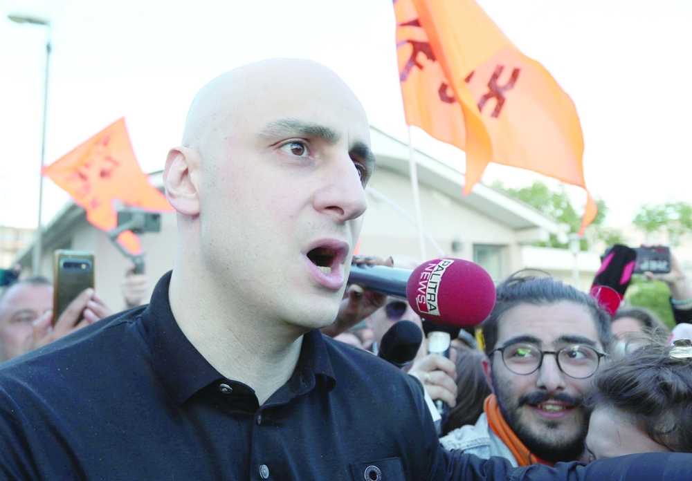 Nika Melia, chairman of the United National Movement party, speaks to the media after a court ordered his release on bail in Rustavi, Georgia. - Reuters