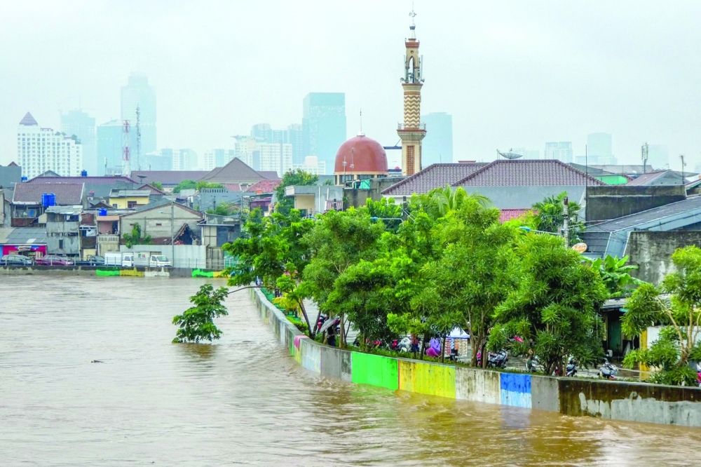 This file photo taken on February 25, 2020, shows a general view of flooded residential houses after heavy rain in Jakarta. - AFP