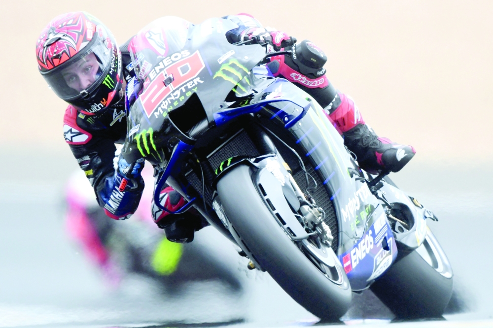 Monster Energy Yamaha MotoGP French rider Fabio Quartararo steers his motorbike and clocked the pole position of the Q2 qualifying session in 1'32.600, ahaead of the French Moto GP Grand Prix in Le Mans, northwestern France, on May 15, 2021.  / AFP / Jean-Francois MONIER

