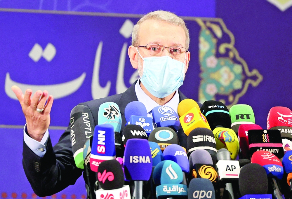 Iran's former parliament speaker Ali Larijani delivers a speech after registering his candidacy for Iran's presidential elections in Tehran. - AFP