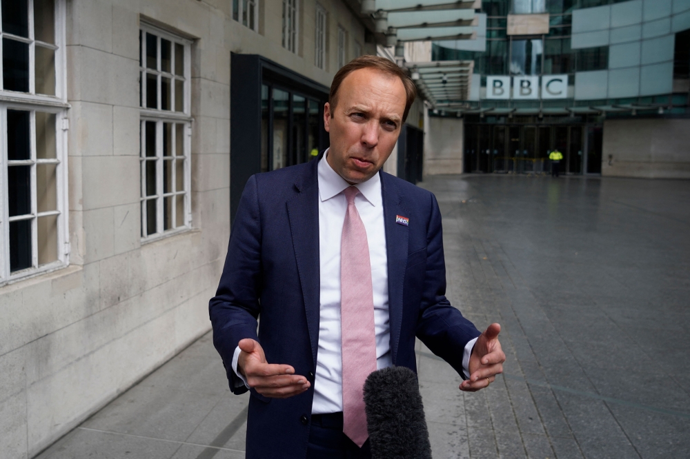 Britain's Health Secretary Matt Hancock gives a media interview as he leaves the BBC in central London on May 16, 2021