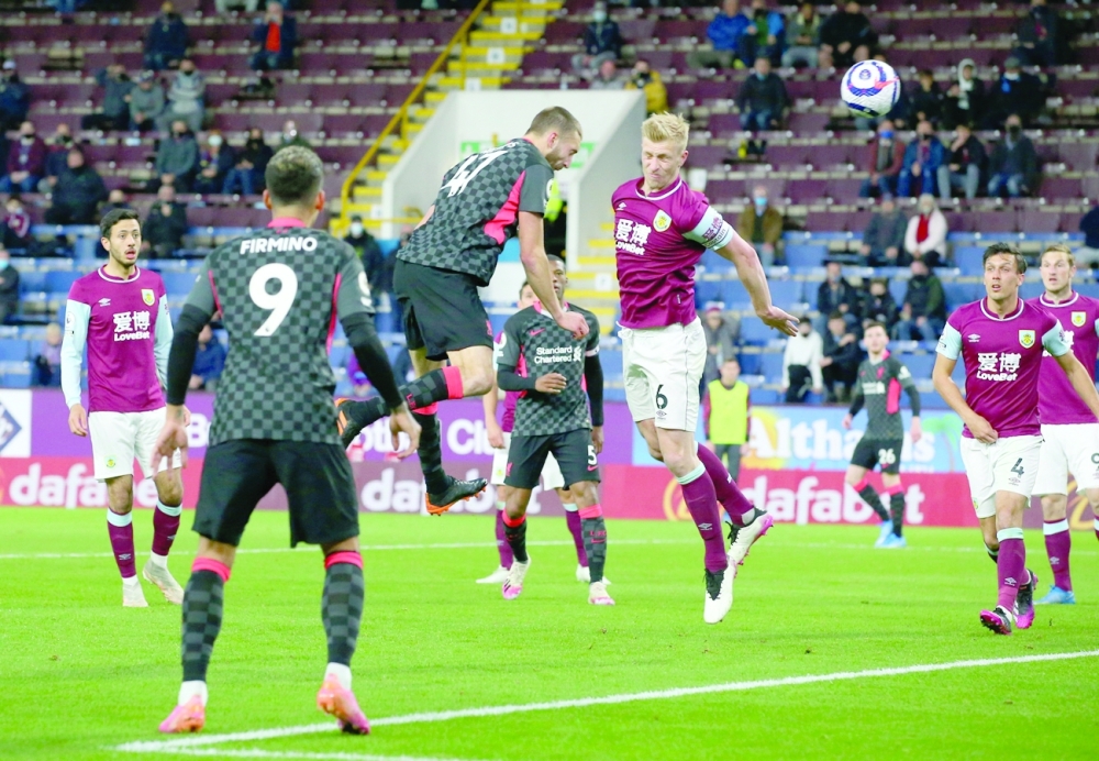 Liverpool's Nathaniel Phillips scores their second goal against Burnley. -- Reuters 