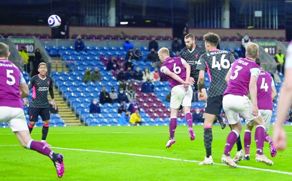 Liverpool's Nathaniel Phillips scores their second goal against Burnley. -- Reuters 