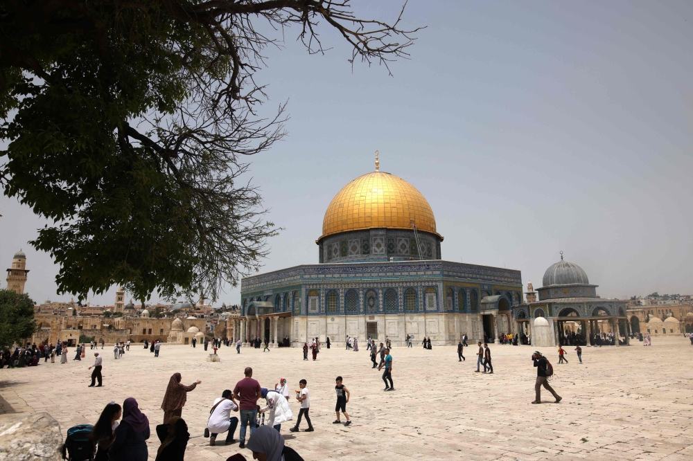 Palestinian worshippers gather for prayers in Jerusalem's al-Aqsa mosque compound, the third holiest site of Islam, on May 21, 2021.