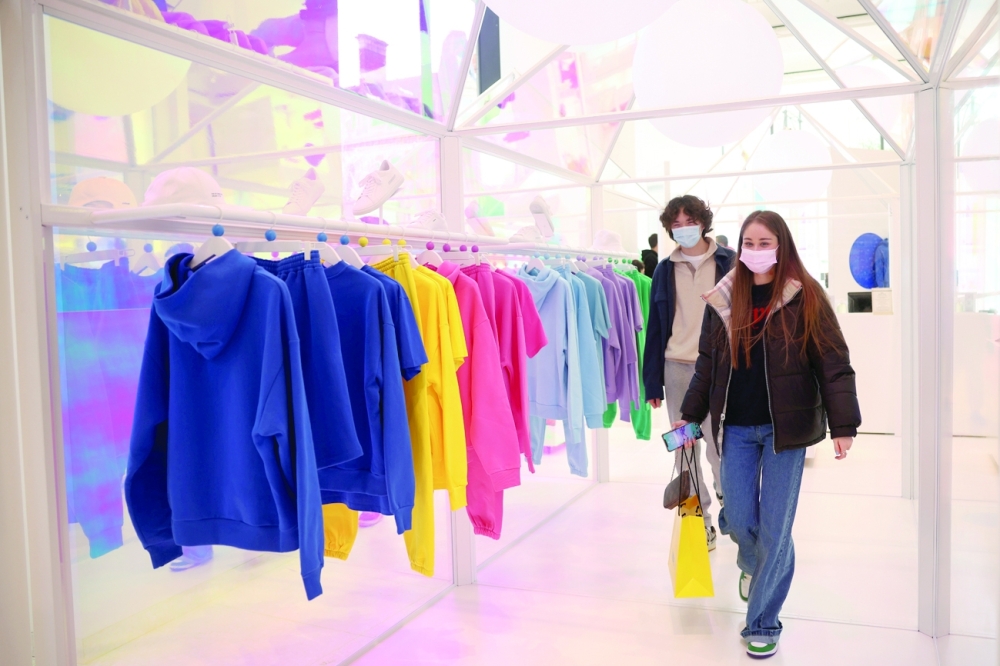 People shop in Selfridges department store on Oxford street as the coronavirus disease restrictions ease in London. - Reuters File Photo