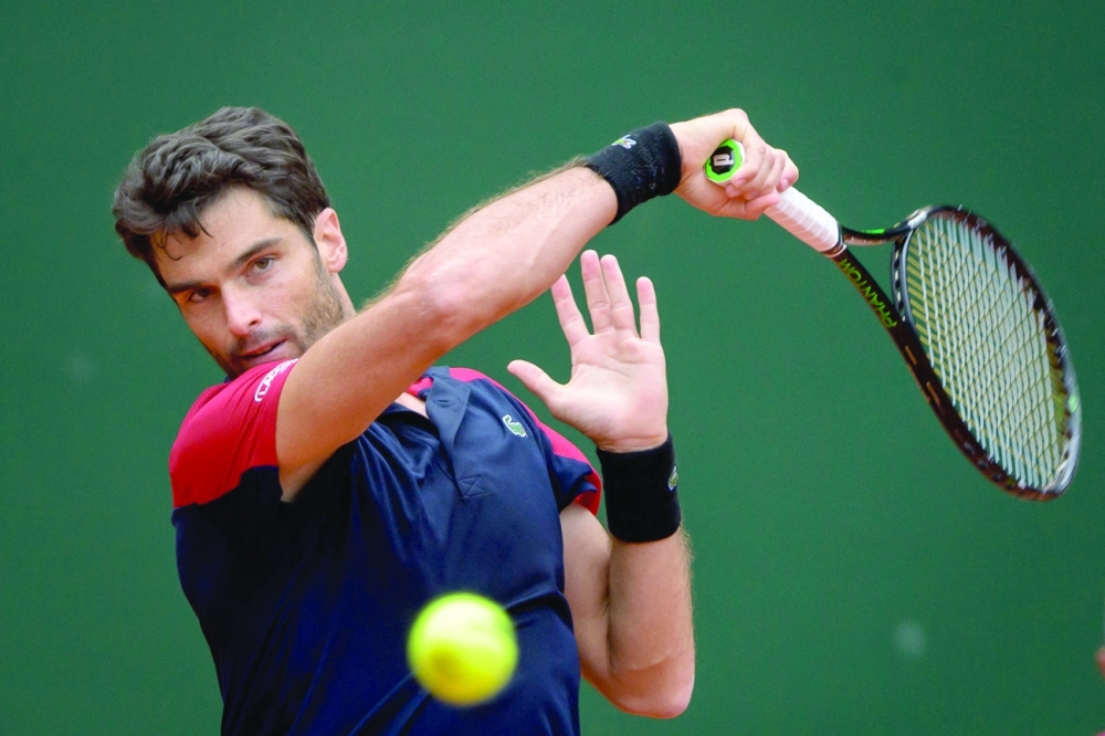 Spain's Pablo Andujar plays a shot at Geneva Open. -- AFP
