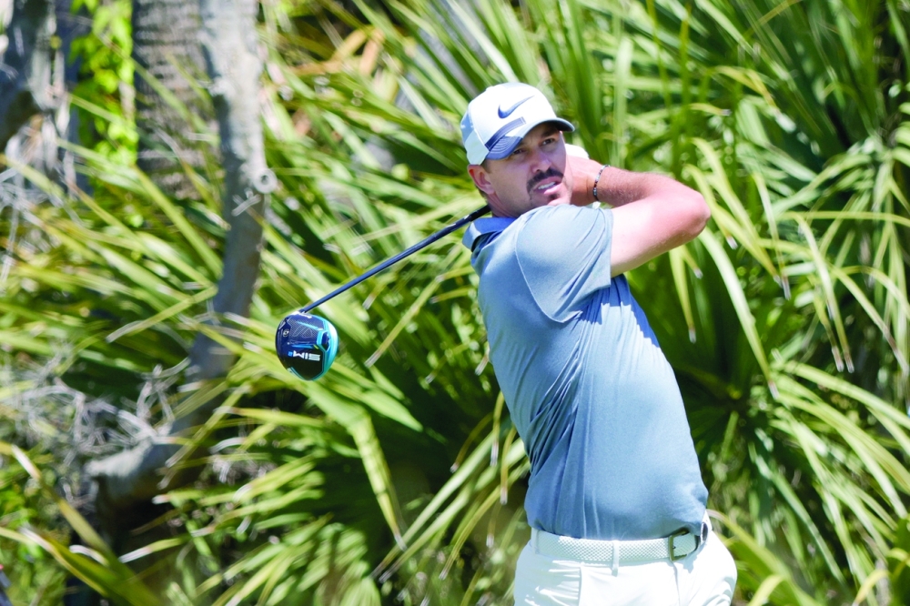 Brooks Koepka hits his tee shot on the second hole during the first round of the PGA Championship tournament. -- USA Today Sports
