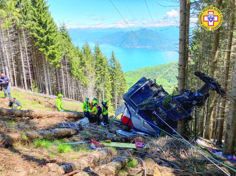 A crashed cable car is seen after it collapsed in Stresa, near Lake Maggiore, Italy. - Reuters

