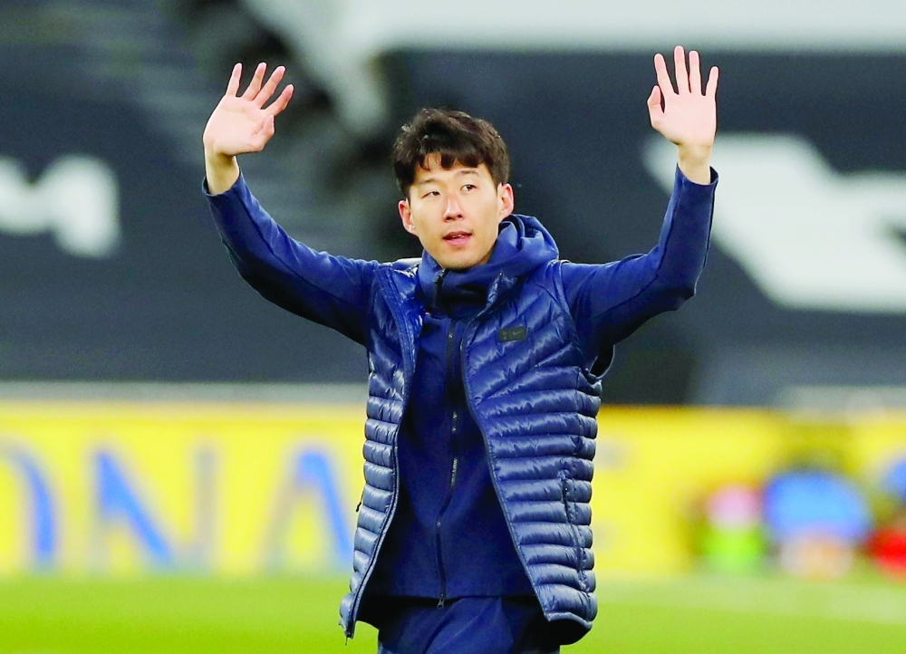 Tottenham Hotspur's Son Heung-min applauds to fans. -- Reuters