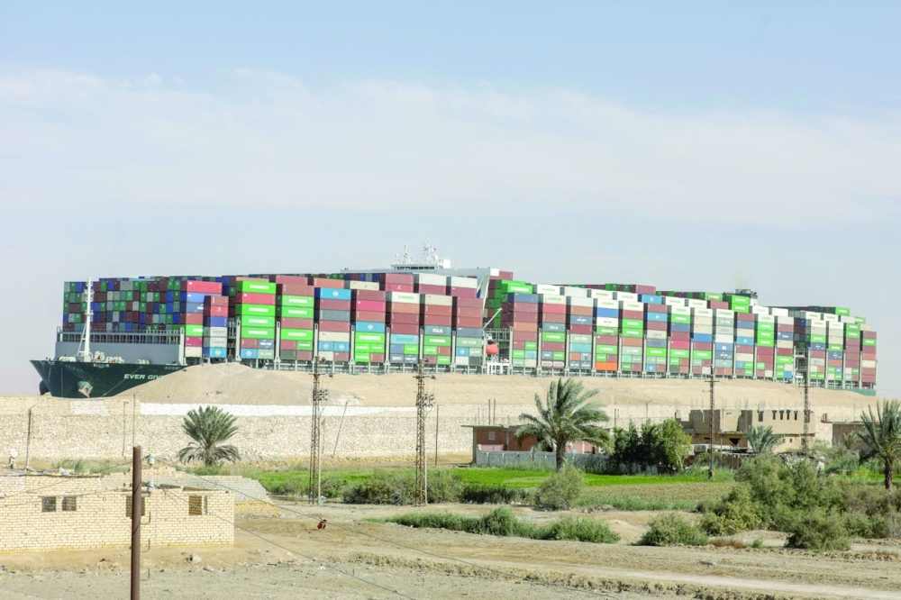 Ever Given, one of the world's largest container ships, is seen after it was fully floated in Suez Canal. Reuters file photo
