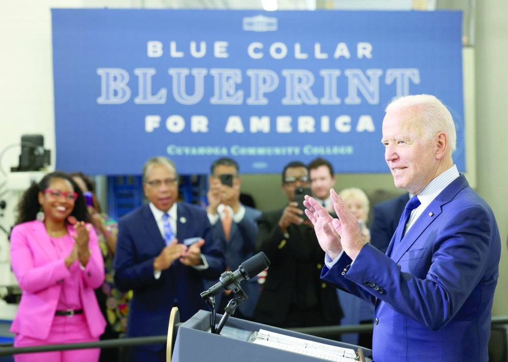 US President Joe Biden reacts after delivering remarks on the economy during a visit to Cuyahoga Community College in Cleveland, Ohio. - Reuters