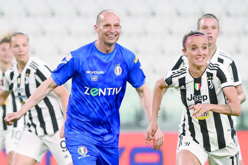 Former Juventus' coach Massimiliano Allegri (C) attends the charity football match at the Allianz Stadium in Turin. -- AFP