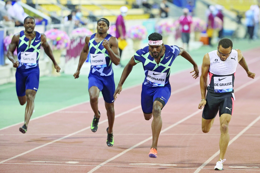 US Kenny Bednarek (2nd-R) competes in the men's 200m final during the Diamond League athletics at the Qatar Sports Club stadium in Doha. -- AFP