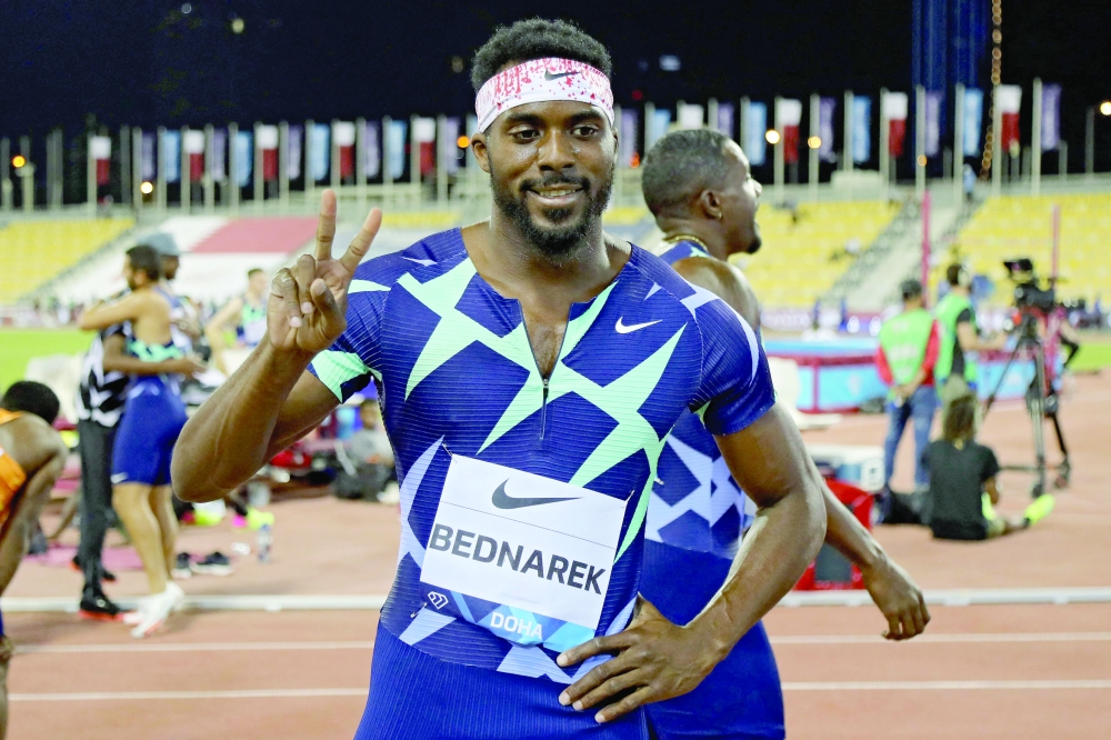 US Kenny Bednarek celebrates after winning the men's 200m final during the Diamond League athletics at the Qatar Sports Club stadium in Doha. -- AFP