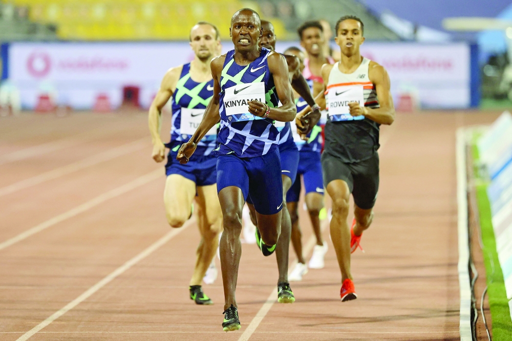 Kenya's Wycliffe Kinyamal (C) competes in the men's 800m final. -- AFP 