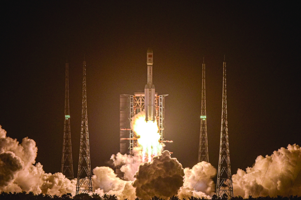 A Long March 7 rocket, carrying China's Tianzhou-2 cargo craft, lifts off from the Wenchang Space Launch Centre in southern China's Hainan province. - AFP 