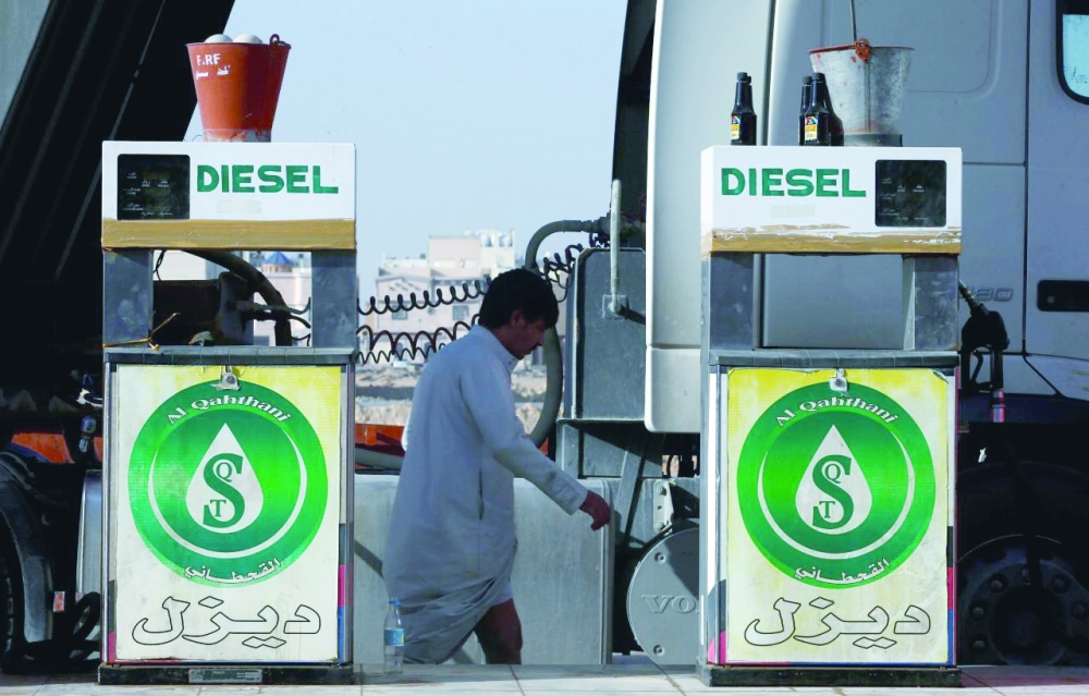A man walks at a petrol station in Riyadh, Saudi Arabia. — Reuters