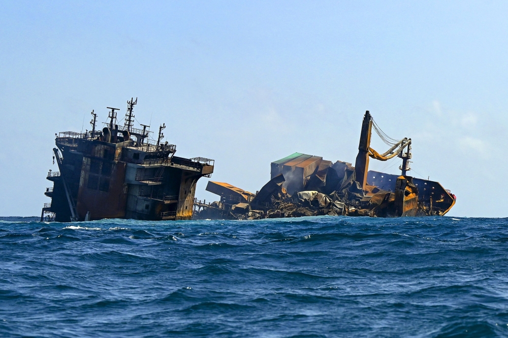 The Singapore-registered container ship MV X-Press Pearl sinks after burning for almost two weeks outside Colombo's harbour.  