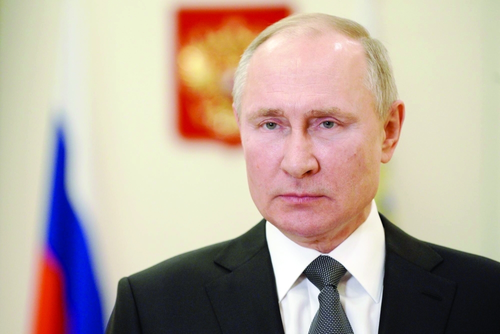 Russian President Vladimir Putin congratulates servicemen and veterans at the Special Operations Forces Day at Novo-Ogaryovo residence, outside Moscow