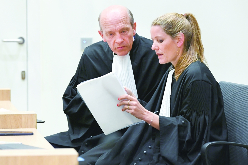 Lawyers attend the MH17 trial of three Russians and a Ukrainian as it enters a critical next stage, in the Schiphol Judicial Complex, Badhoevedorp on Monday — Reuters