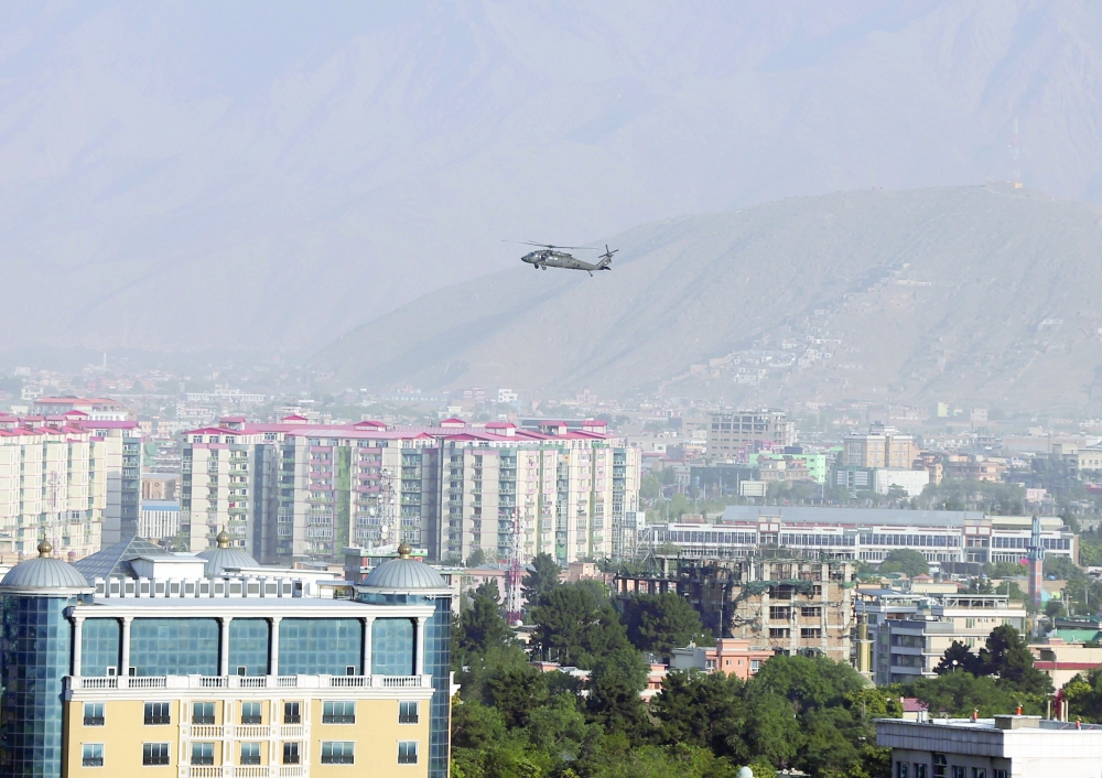 A Nato helicopter flies over the city of Kabul, on June 29, 2020. - Reuters file photo