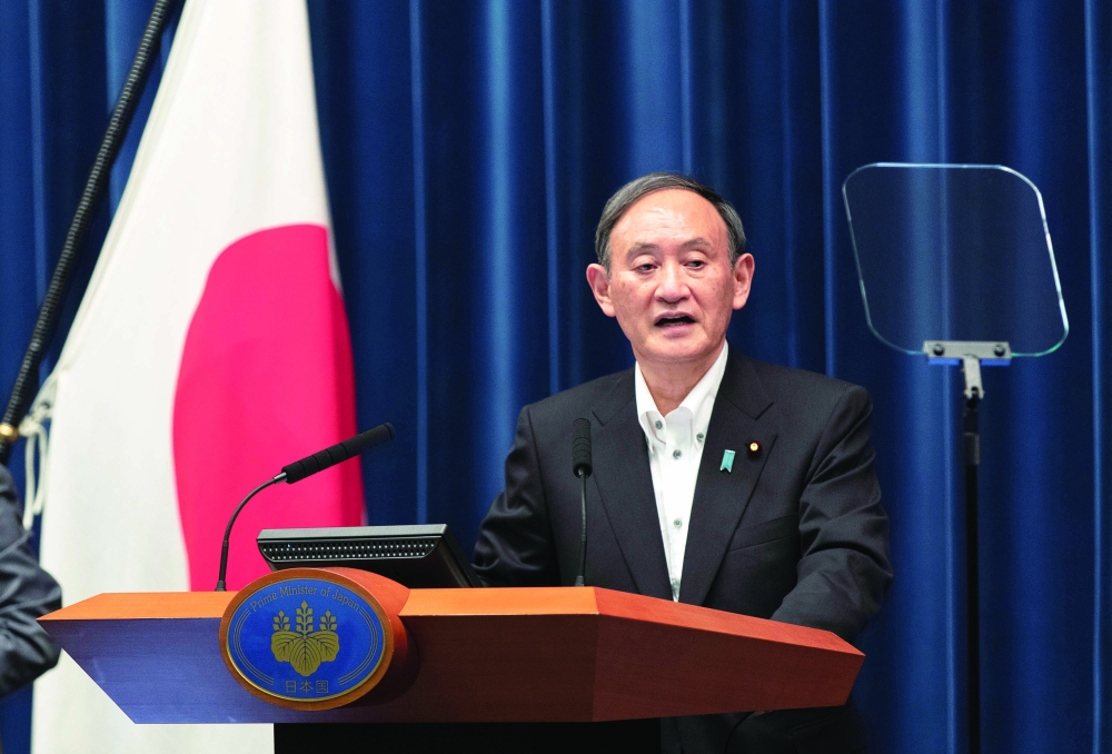 Japanese Prime Minister Suga holds a news conference in Tokyo. — Reuters