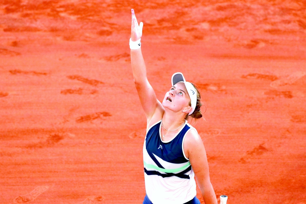 Czech Republic's Barbora Krejcikova celebrates winning her semifinal against Greece's Maria Sakkari. -- Reuters