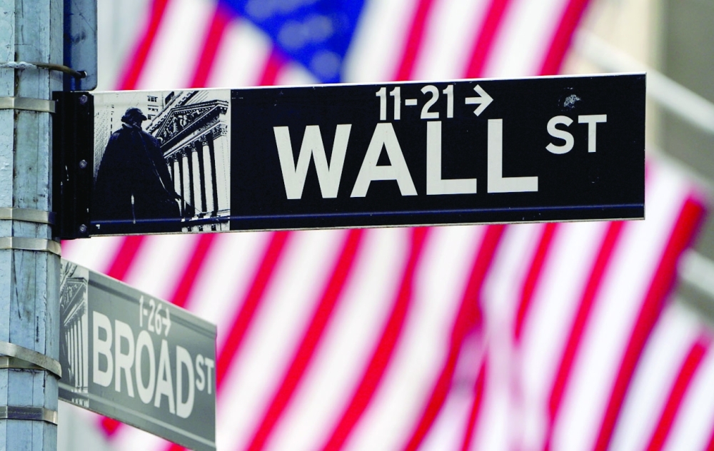 A Wall Street sign is pictured outside the New York Stock Exchange amid the coronavirus disease pandemic in the Manhattan borough of New York City. - Reuters 