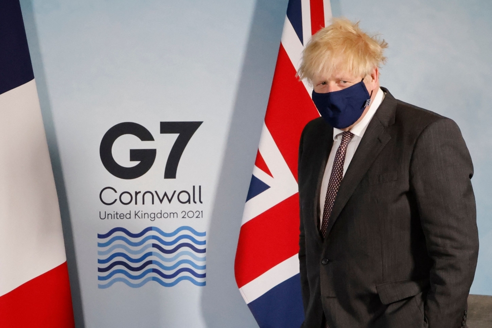 Britain's Prime Minister Boris Johnson arrives for a bilateral meeting in Carbis Bay, Cornwall during the G7 summit on June 12, 2021. 