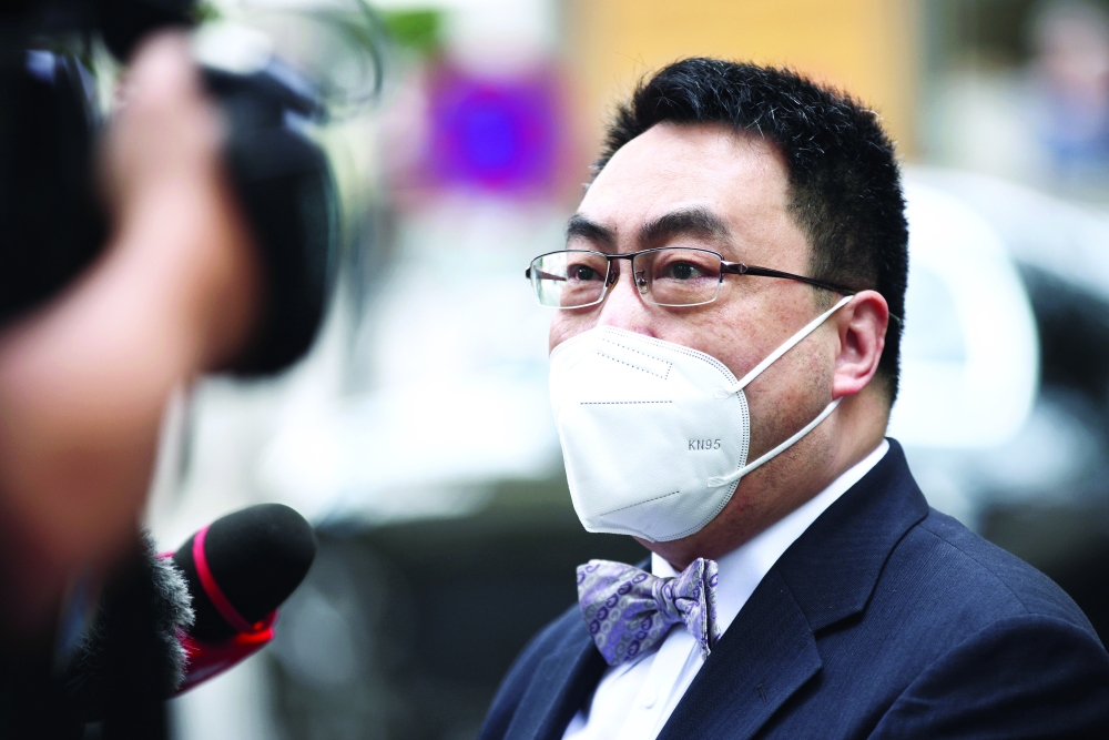 The ambassador of the Permanent Mission of China to the United Nations, Wang Qun, talks to the media after a meeting in Vienna. - Reuters 