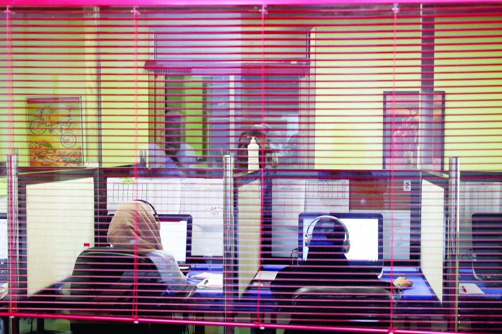 Trauma helpline counselors in Ramallah receive calls from Gaza after the 11-day conflict with Israel, in Ramallah in the Israeli-occupied West Bank. - Reuters 