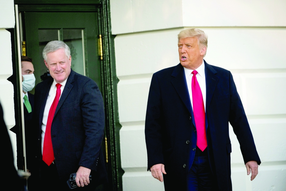 Donald Trump departs with White House Chief of Staff Mark Meadows from the White House to travel to North Carolina for an election rally. — Reuters file photo