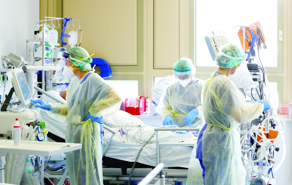 A patient suffering from Covid-19 receives treatment at the Intensive Care Unit (ICU) of a clinic in Darmstadt, Germany. — Reuters