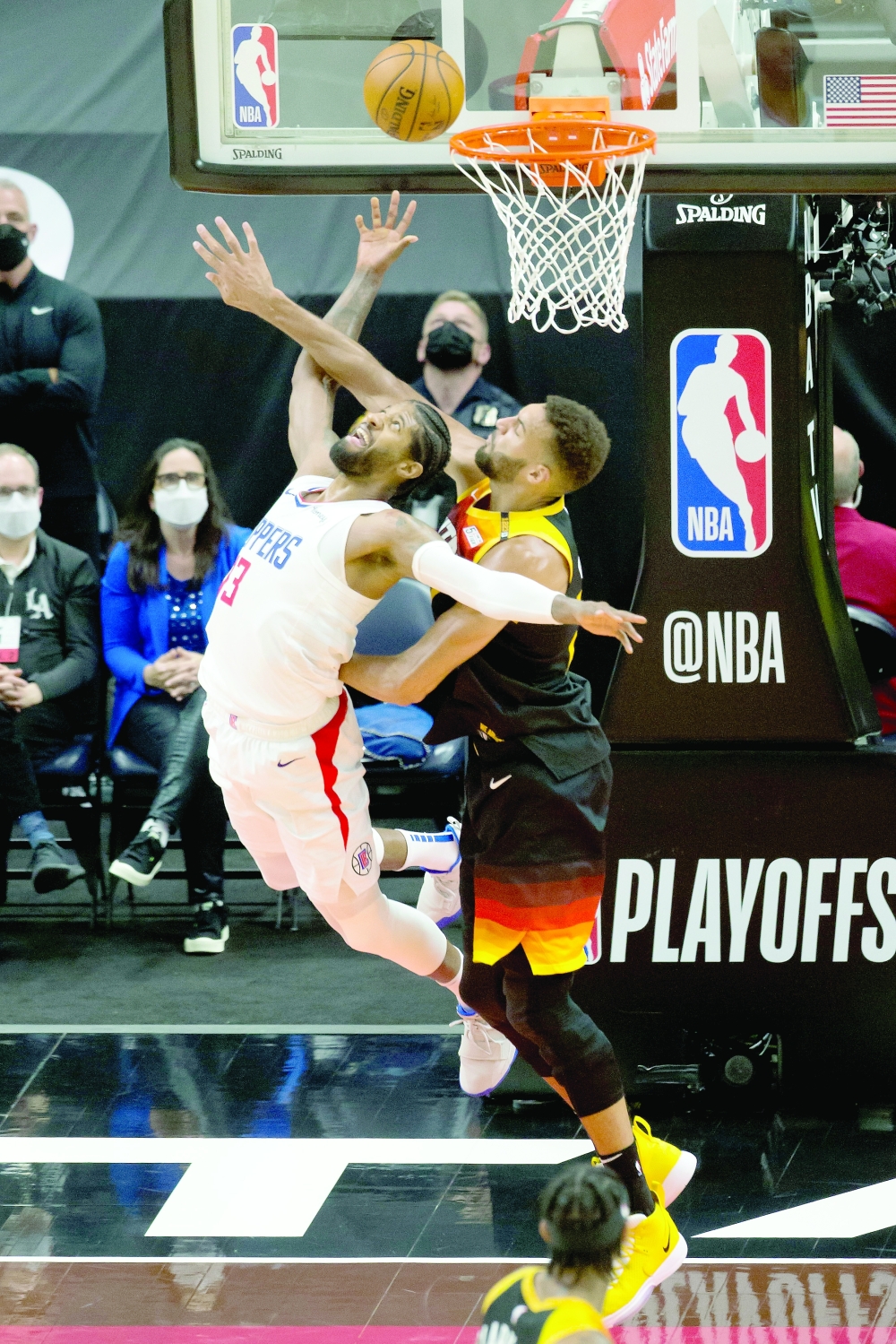 LA Clippers' Paul George (13) shoots the ball against Utah Jazz's Rudy Gobert (27). -- USA Today Sports