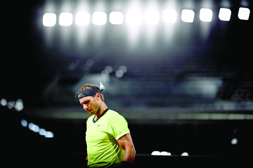 Spain's Rafael Nadal reacts on Day 5 of The Roland Garros 2021 French Open tennis tournament in Paris. -- AFP