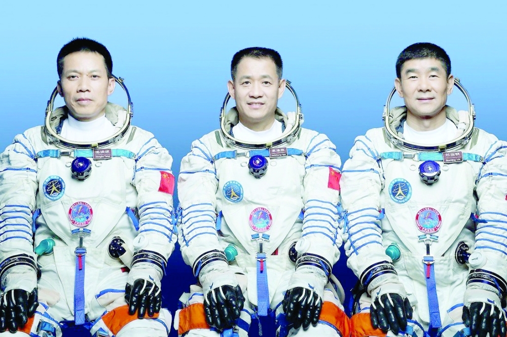 (from left) Tang Hongbo, Nie Haisheng, and Liu Boming. 