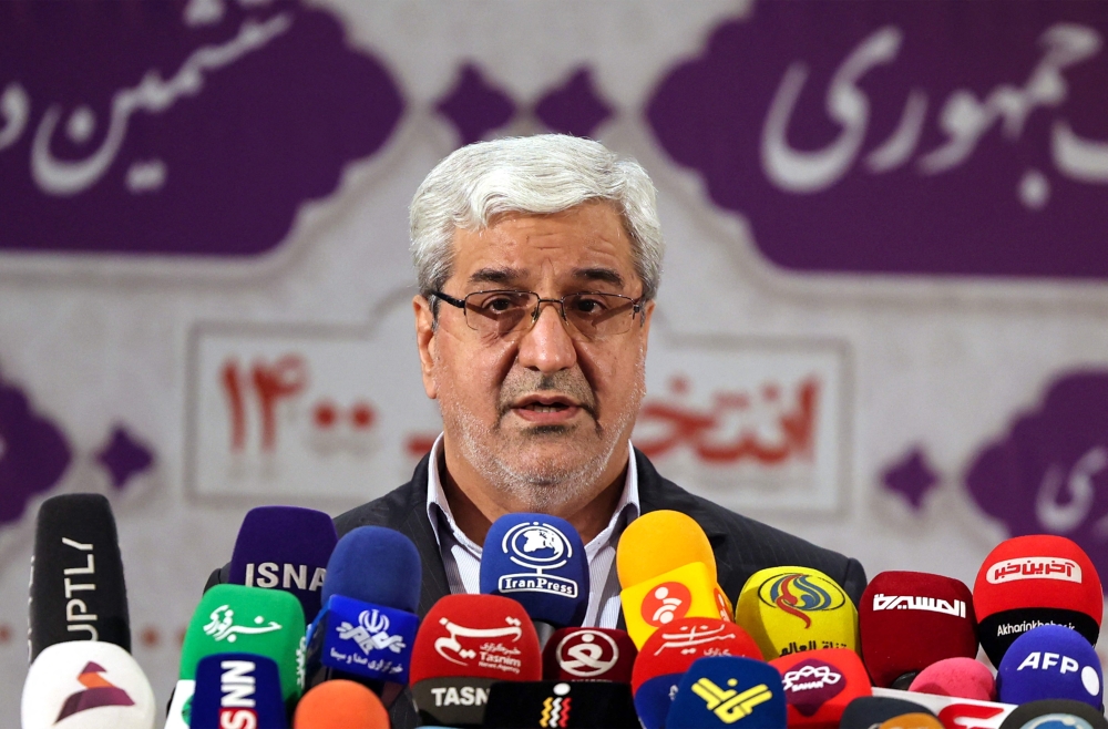 The head of the Iranian election campaign, Jamal Arf, gives an update on the results of the presidential election at the press room of the Ministry of Interior in the capital Tehran, on June 19, 2021. 