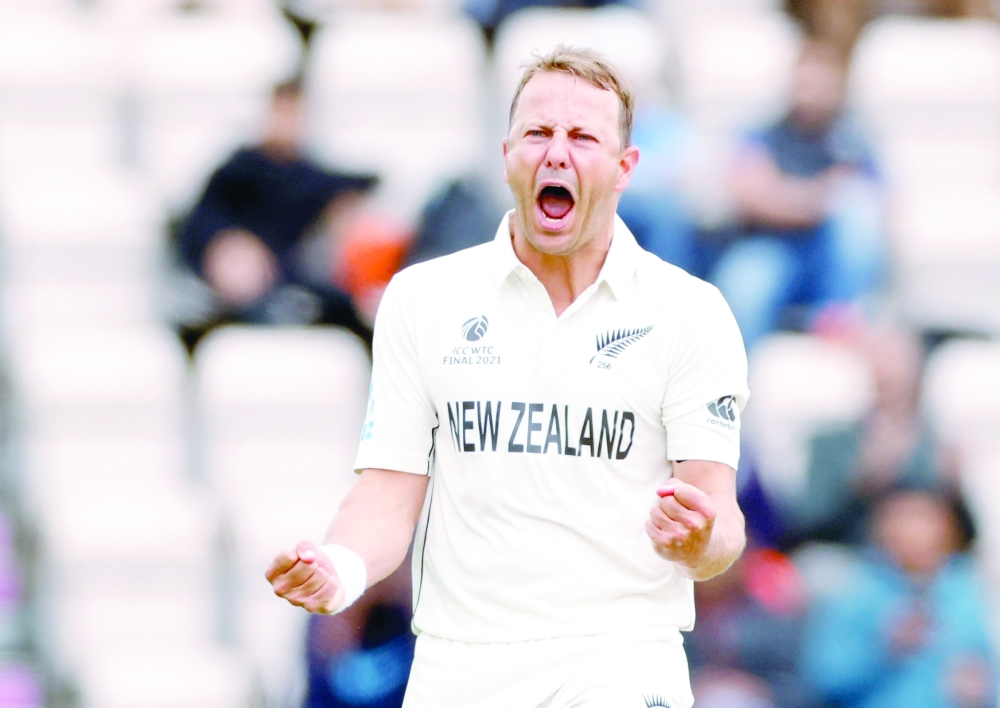New Zealand's Neil Wagner celebrates after taking the wicket of India's Ajinkya Rahane. -- Reuters