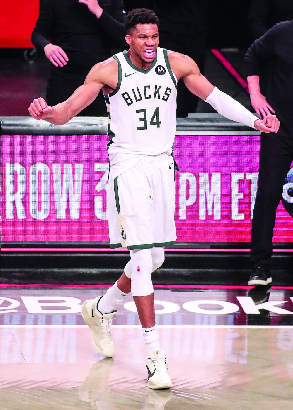 Milwaukee Bucks forward Giannis Antetokounmpo (34) celebrates after defeating the Brooklyn Nets. -- USA Today Sports