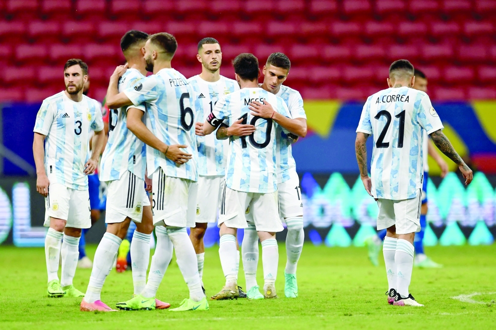 Argentina's footballers react at the end of the match. -- AFP