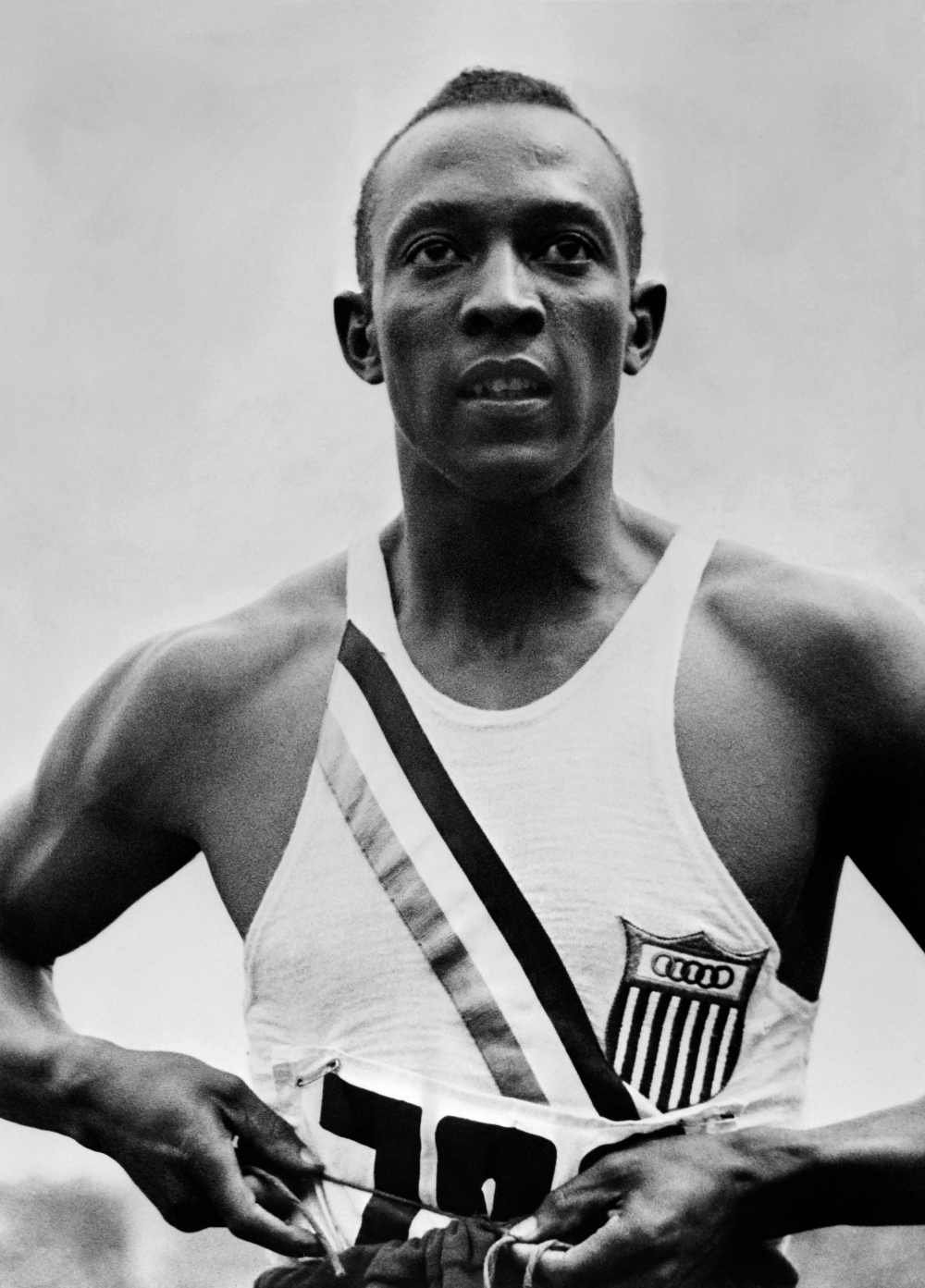 US champion "Jesse" (James Cleveland) Owens during Olympic Games in Berlin, where he captured 4 gold medals, 100m, 200m, 4x100m, and long jump.  