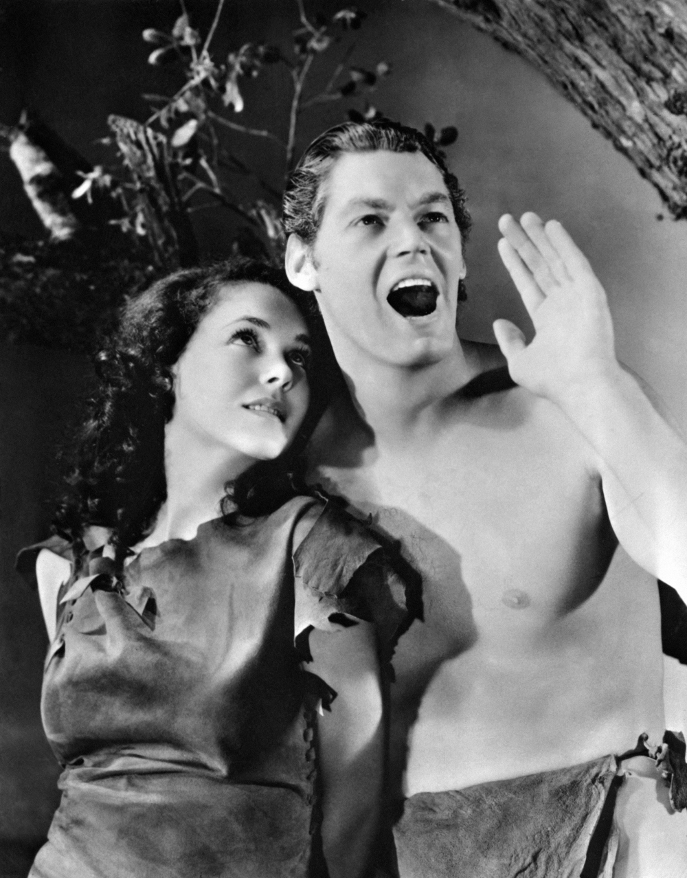 This file photo taken in 1932 from one of the "Tarzan" movies shows Maureen O'Sullivan (L) in the role of Jane and Johnny Weissmuller playing Tarzan. 