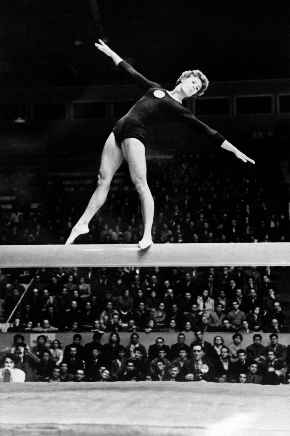 Soviet Larissa Latynina performs her routine on the beam during the Olympic Games in Melbourne. 